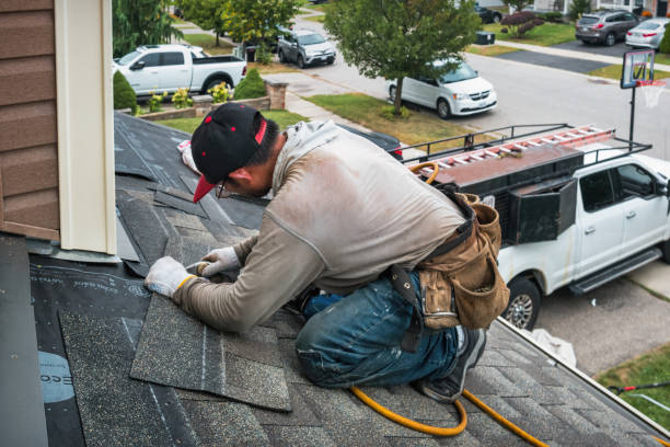Professional Roofing technician working in Calverton Park, MO